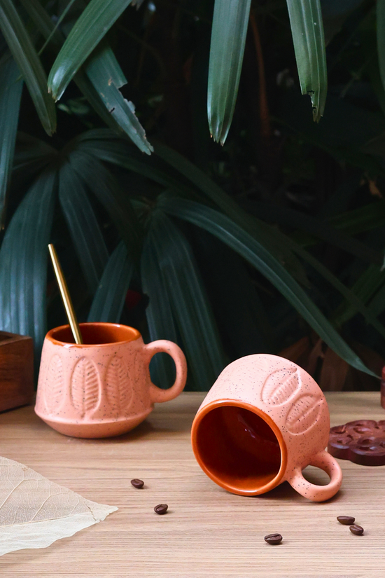 Ceramic mugs, rust color in it