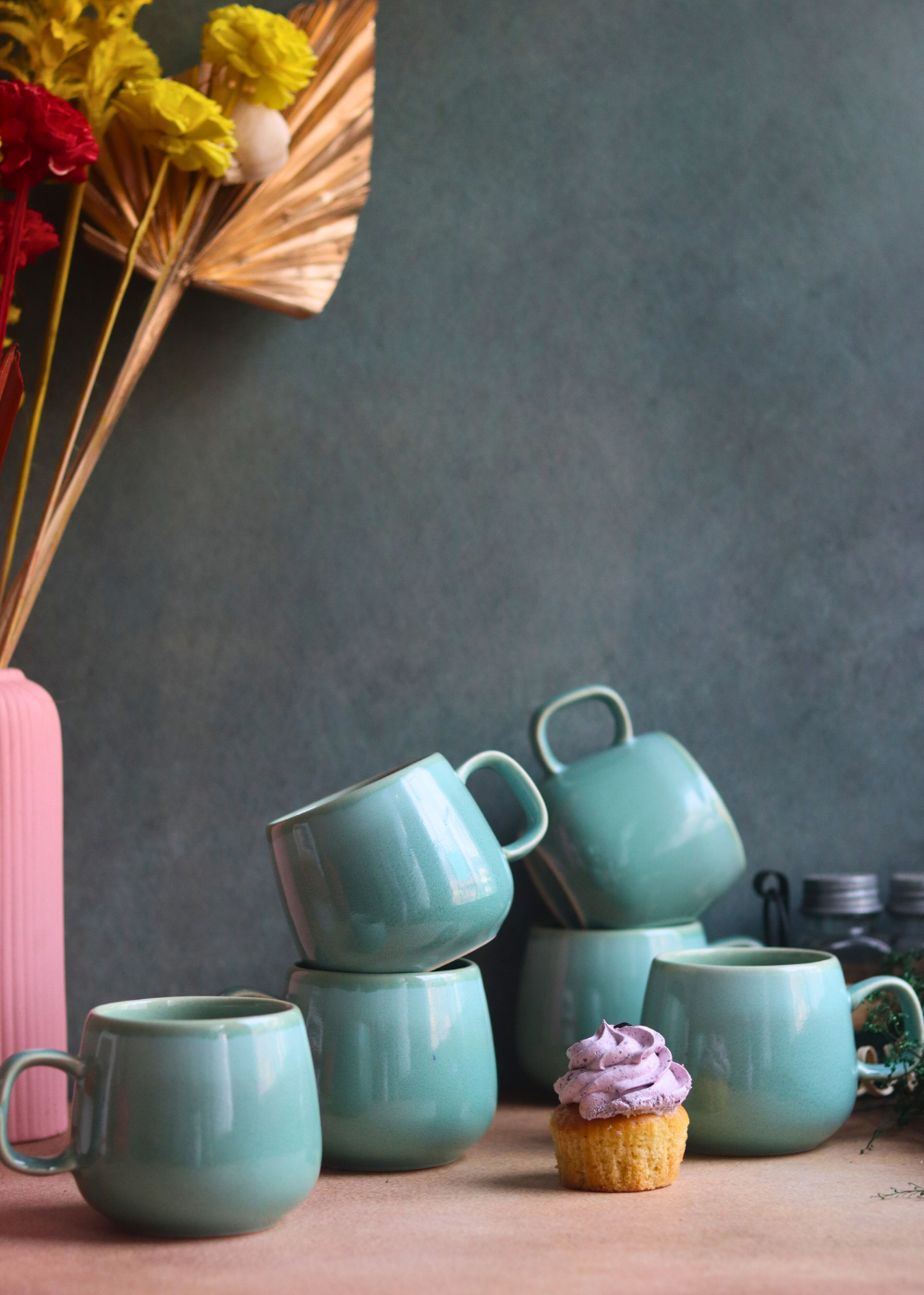 handmade teal chai cups with delicious dessert