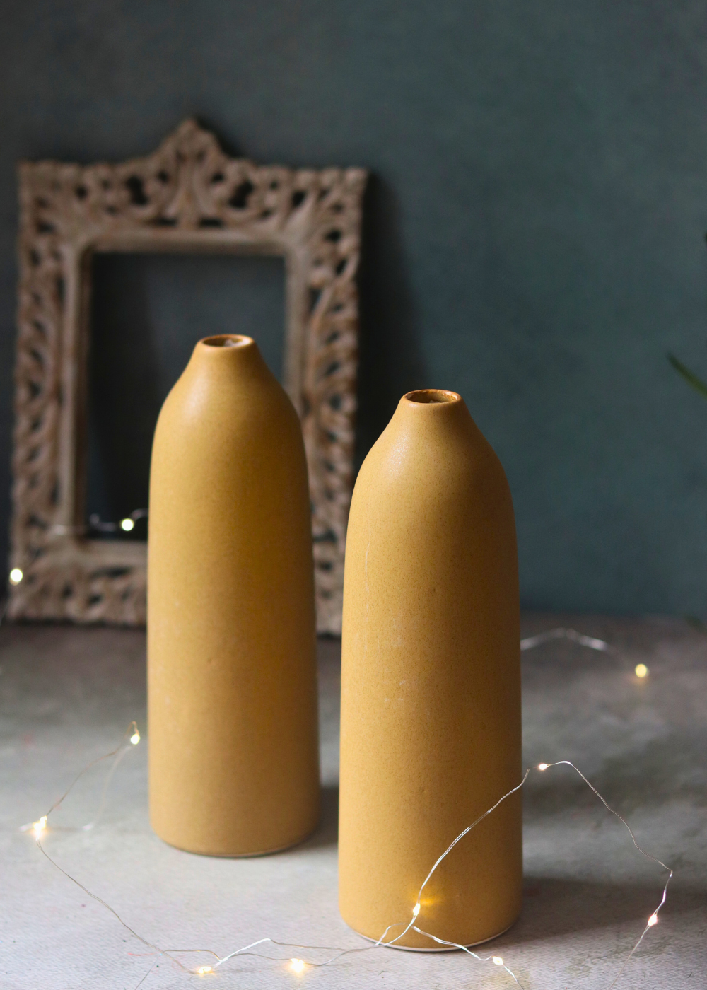 Two ceramic tall brown vases 