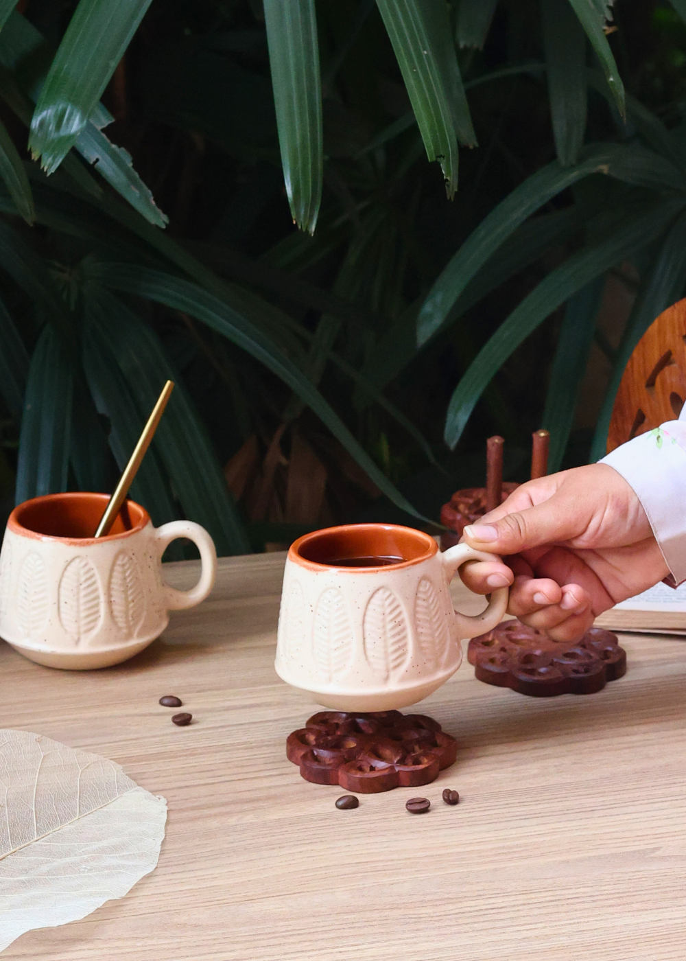 Drinkware ceramic white serene leaf coffee mug in hand