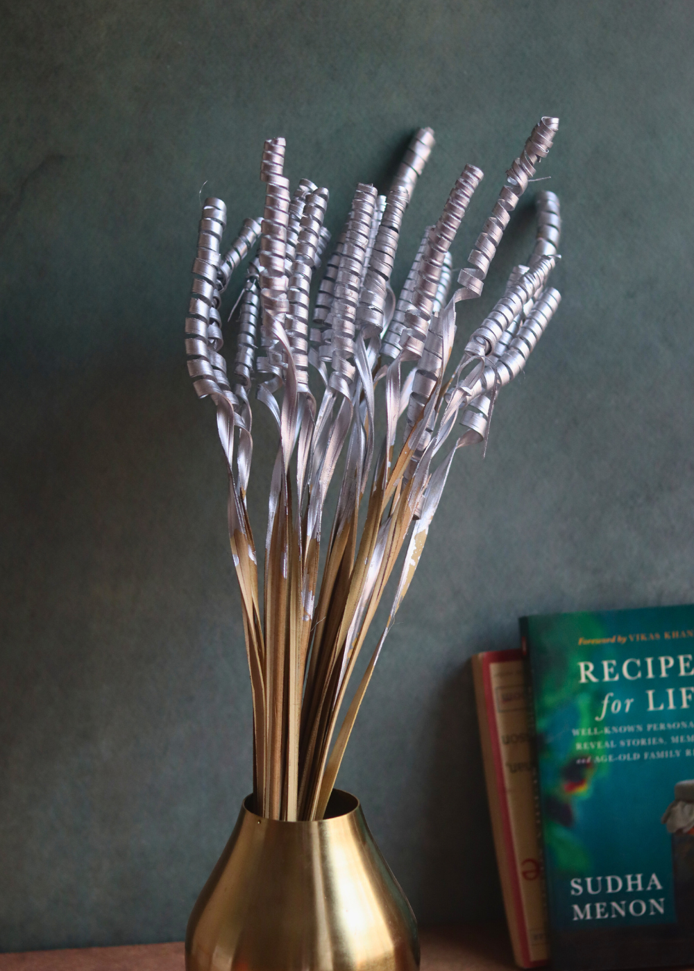 silver twirl bunch with golden vase