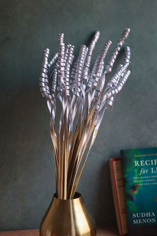 silver twirl bunch with golden vase