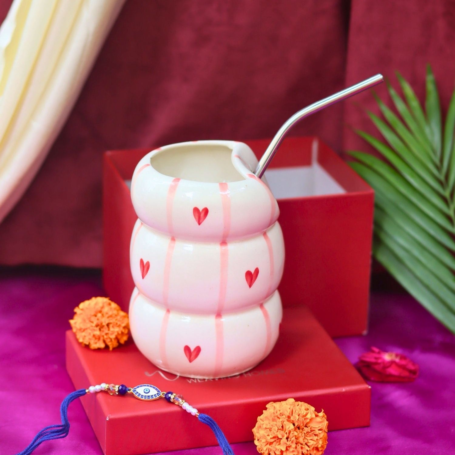 Heart Sipper with Rakhi Gift box made by ceramic