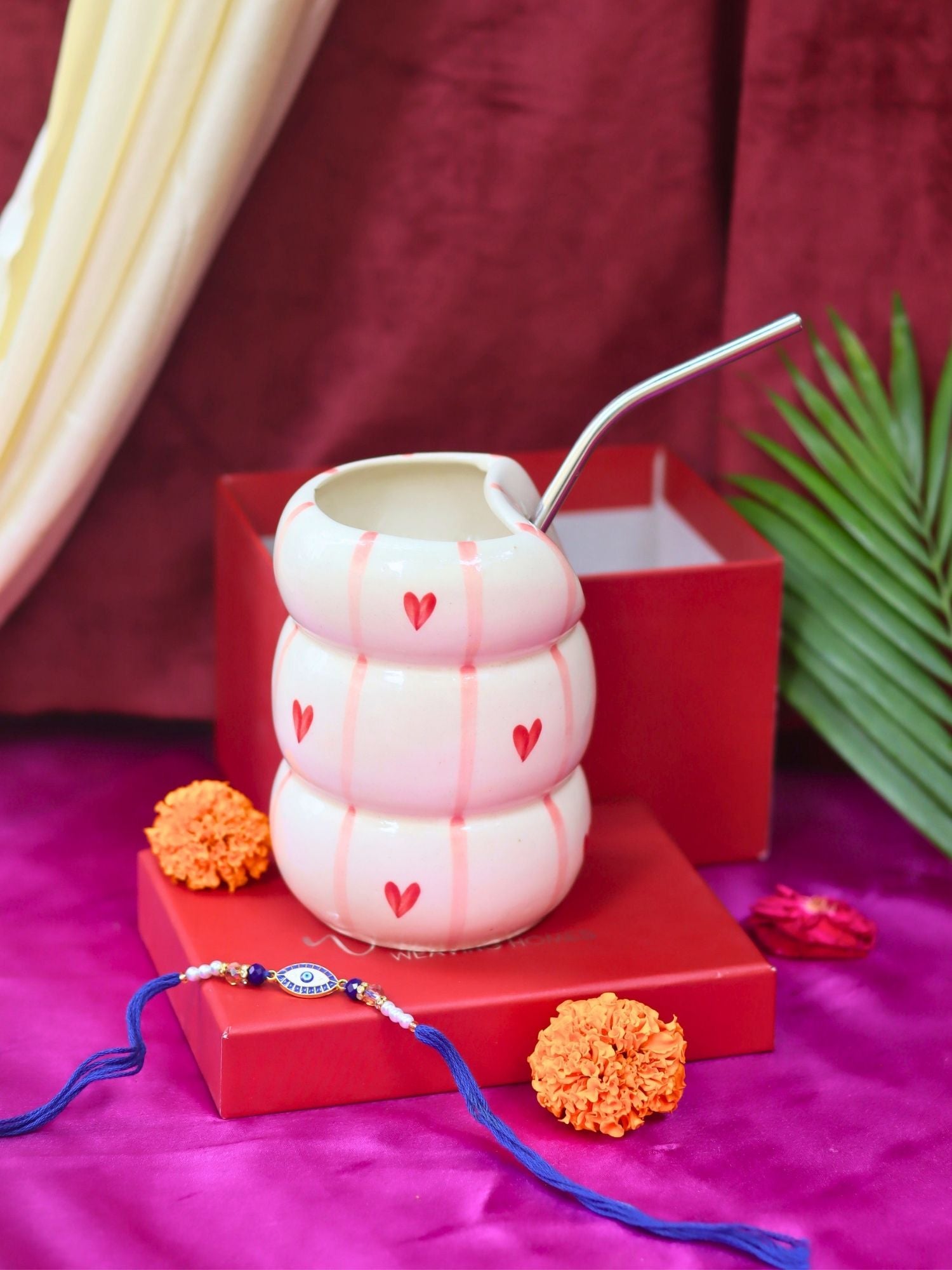 Heart Sipper with Rakhi Gift box made by ceramic