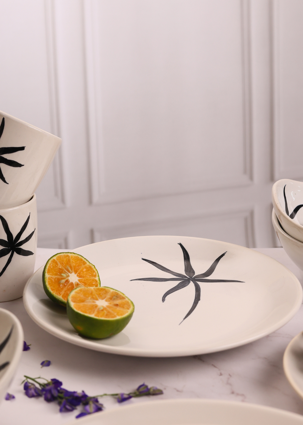 White plate with leaf print on it