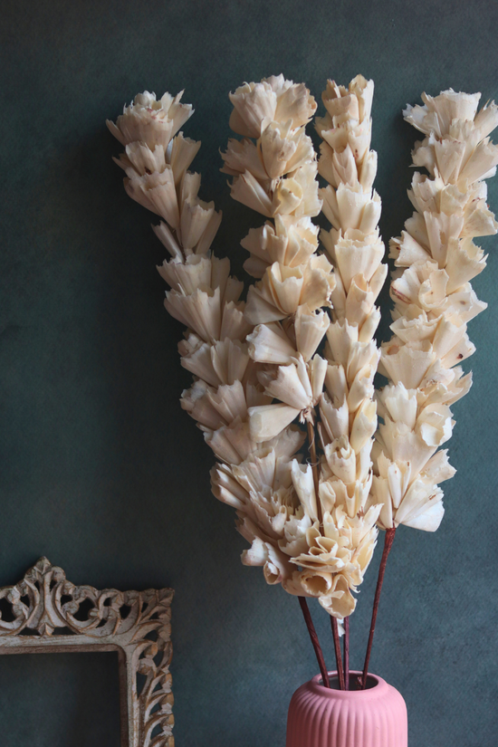 white lily bunch with pink vase