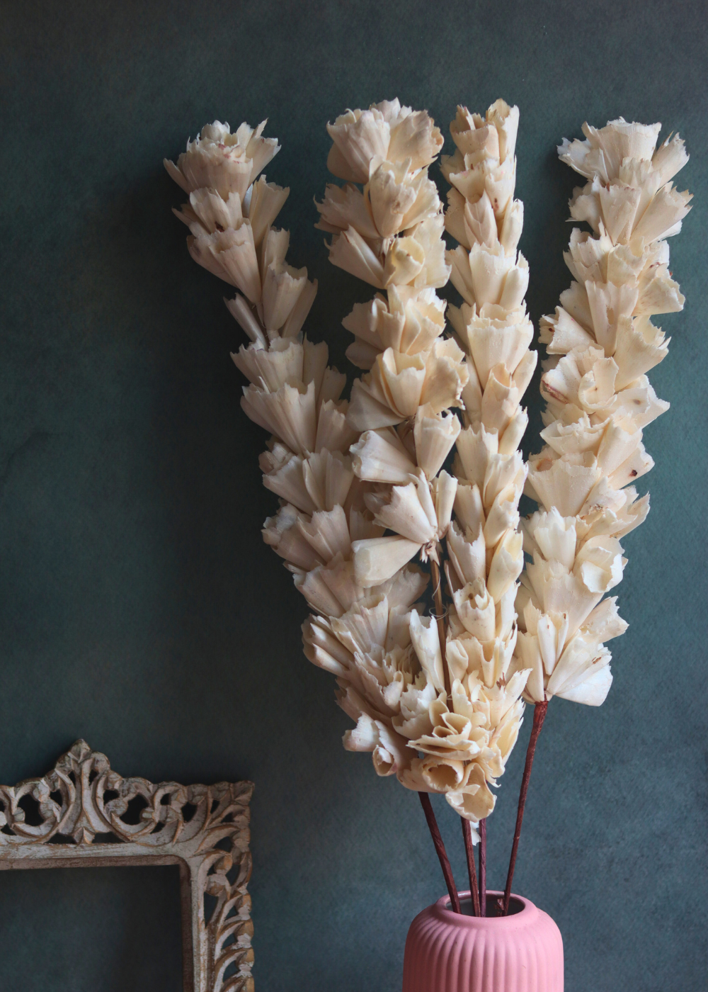 white lily bunch with pink vase