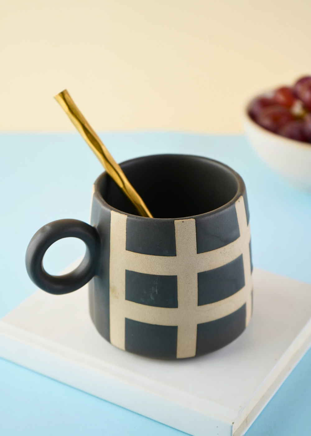 handmade black checkered mug with with checkered llnes 