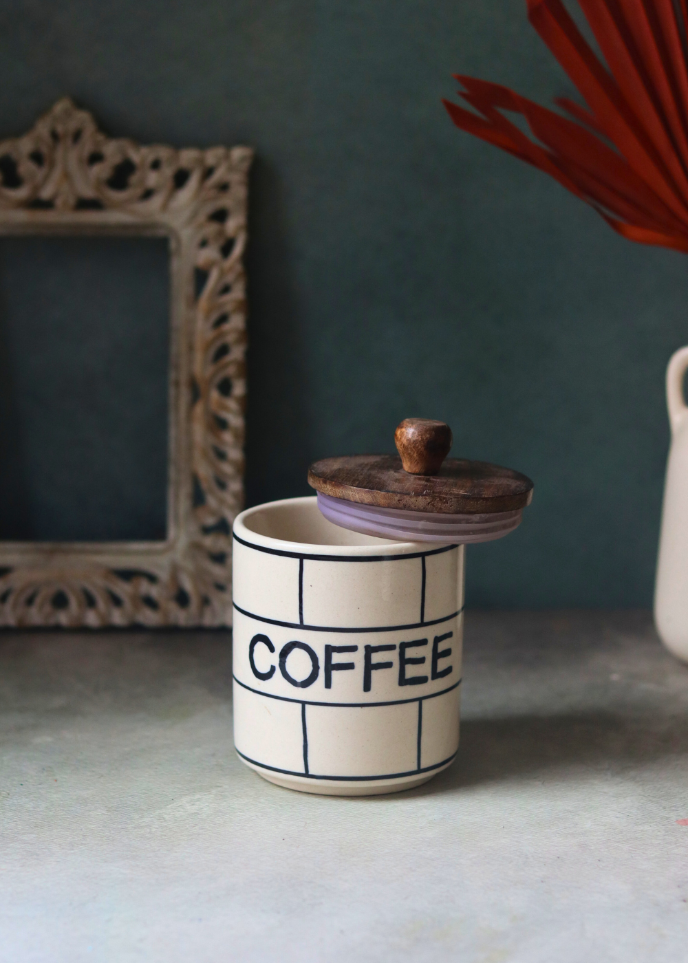Checkered coffee jar made with ceramic 