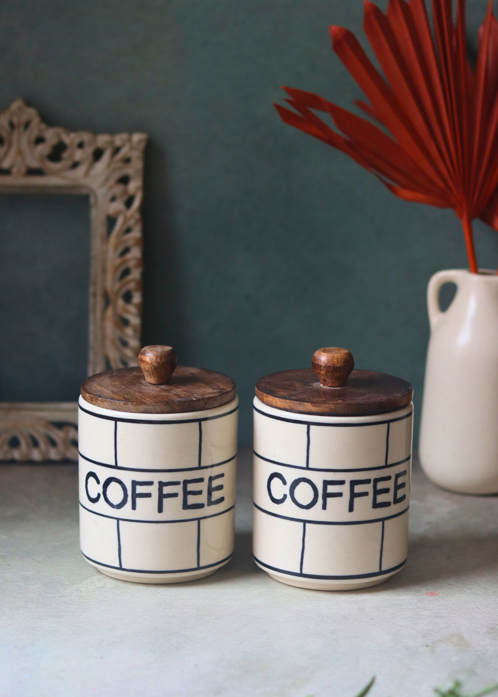 Two chequered coffee jars handmade ceramic