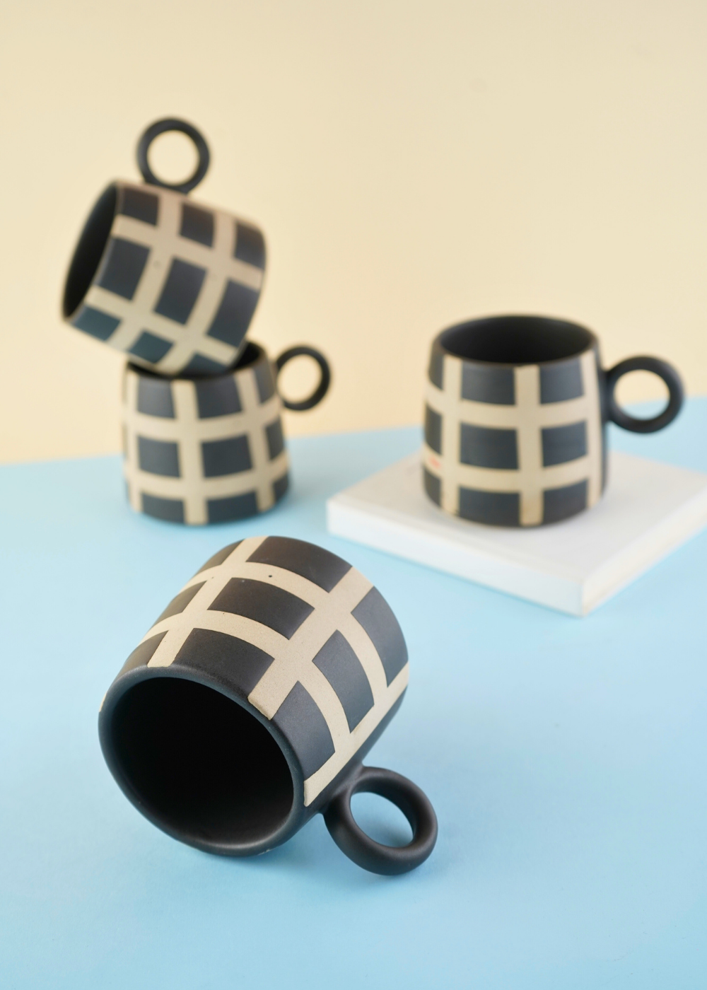 black checkered Mug with ceramic material