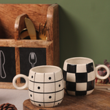 handmade cuddle mugs with chess & polka design