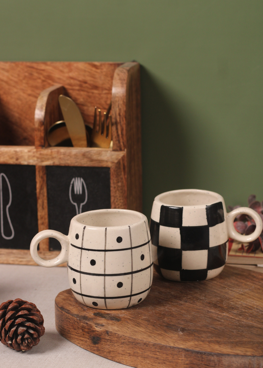 handmade cuddle mugs with chess & polka design