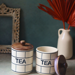 Handmade ceramic tea jar with open lid