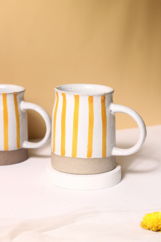 handmade yellow striped mug made by ceramic 