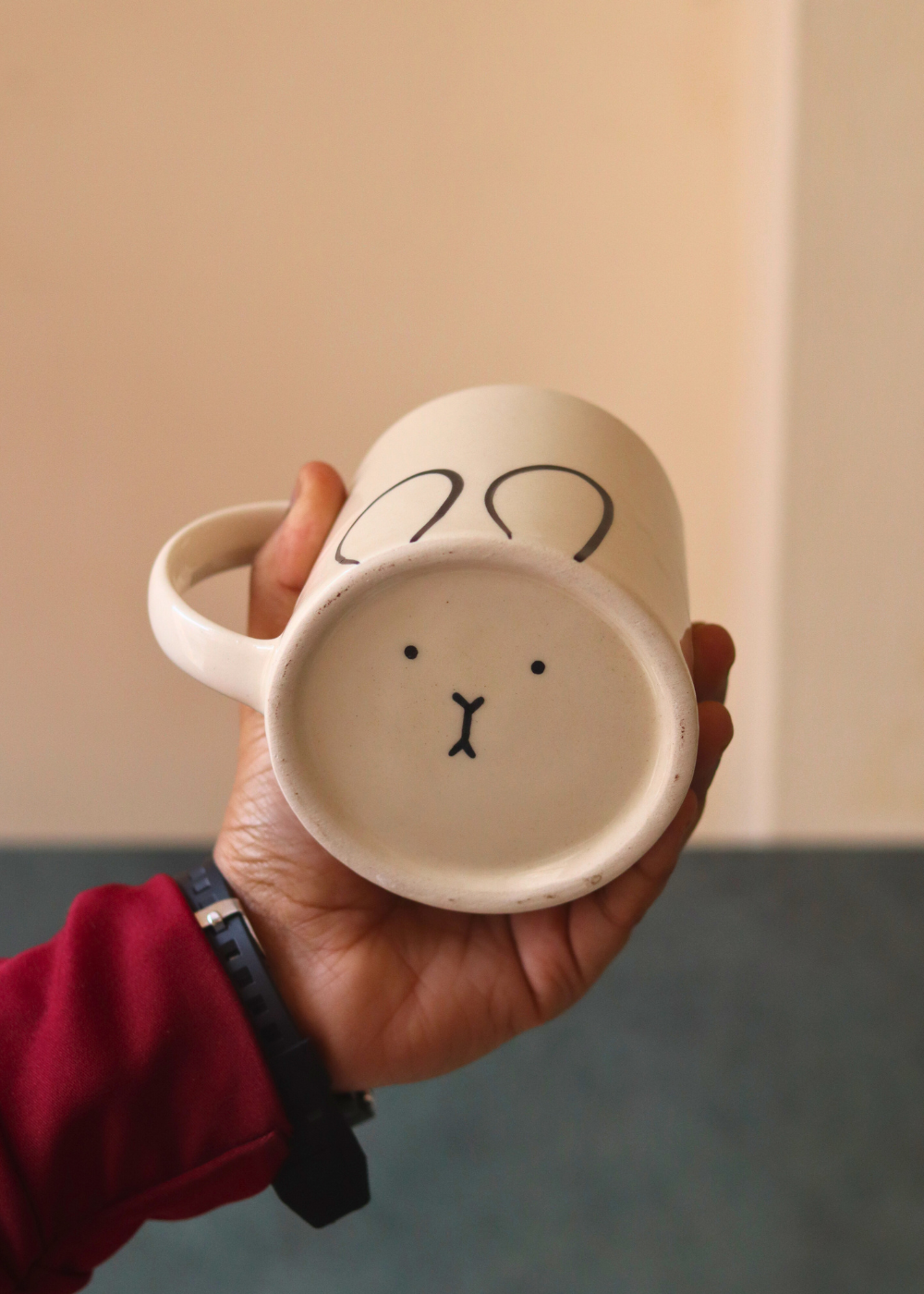 Bunny designed coffee mug in hand 