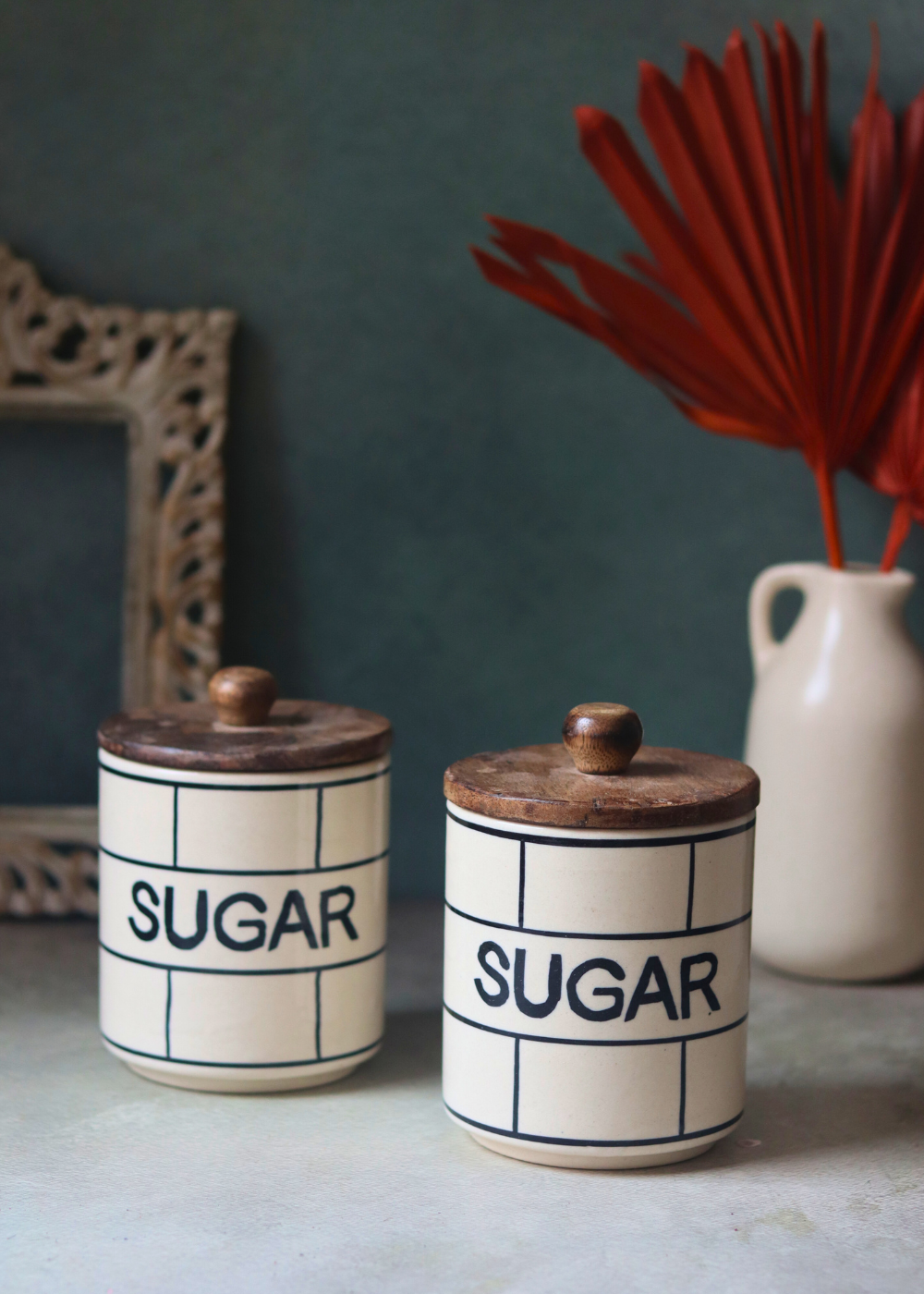 White & black handmade ceramic checkered sugar jars