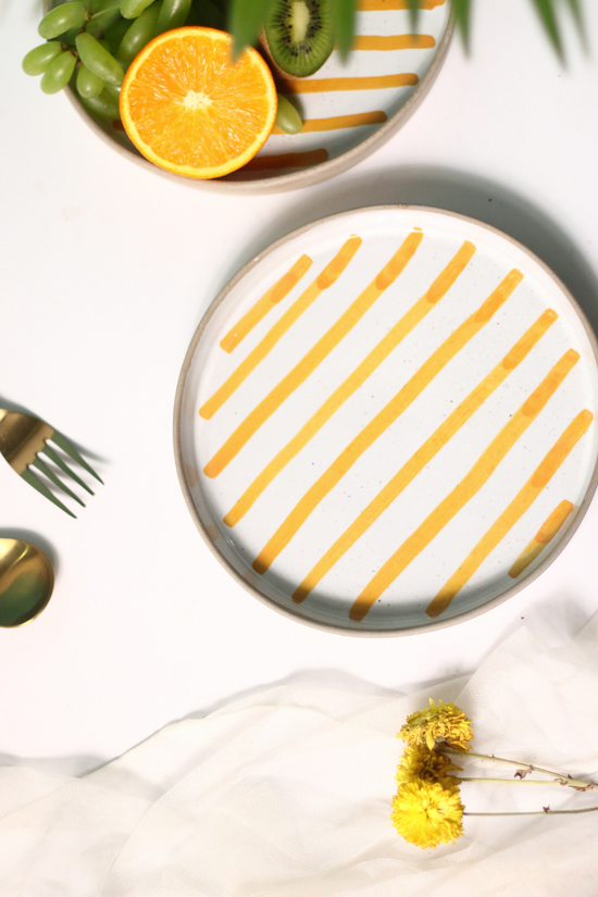 handmade yellow striped platter with white & yellow color 