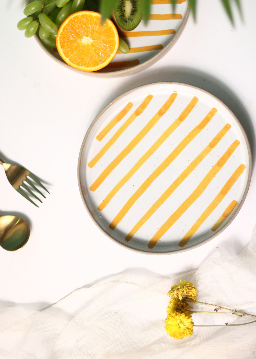 handmade yellow striped platter with white & yellow color 