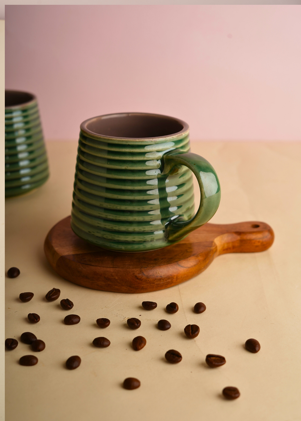 Handmade coffee mug with beans 