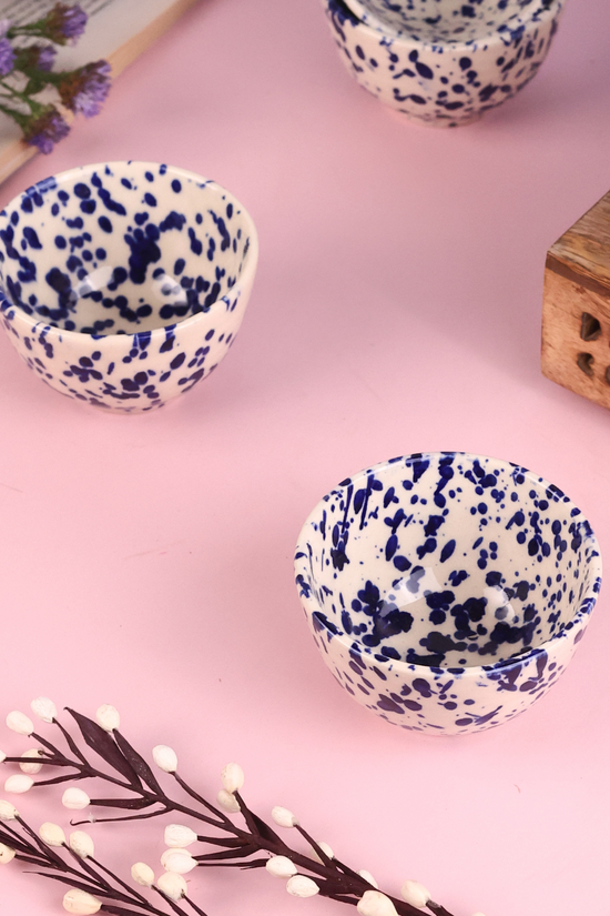 Blue flecked bowl with flower