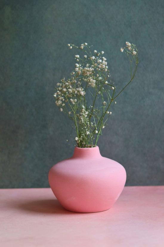 esoteric vase round pink made by ceramic 