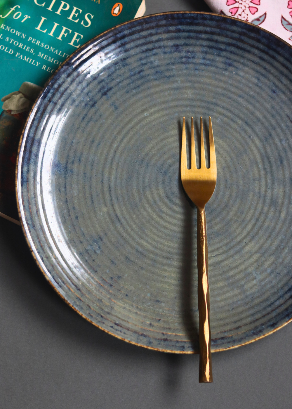 Gold hammered mini fork on plate 
