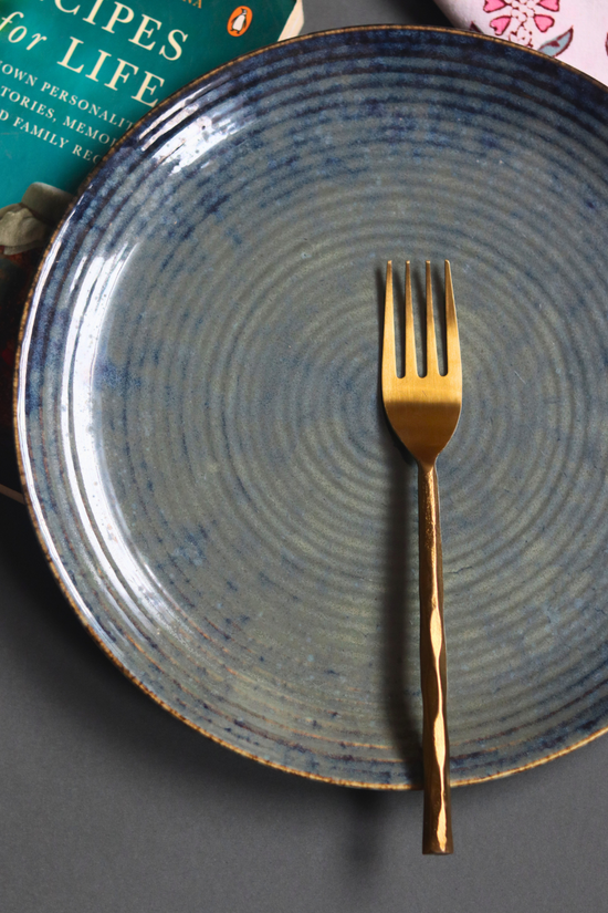 Gold hammered mini fork on plate 