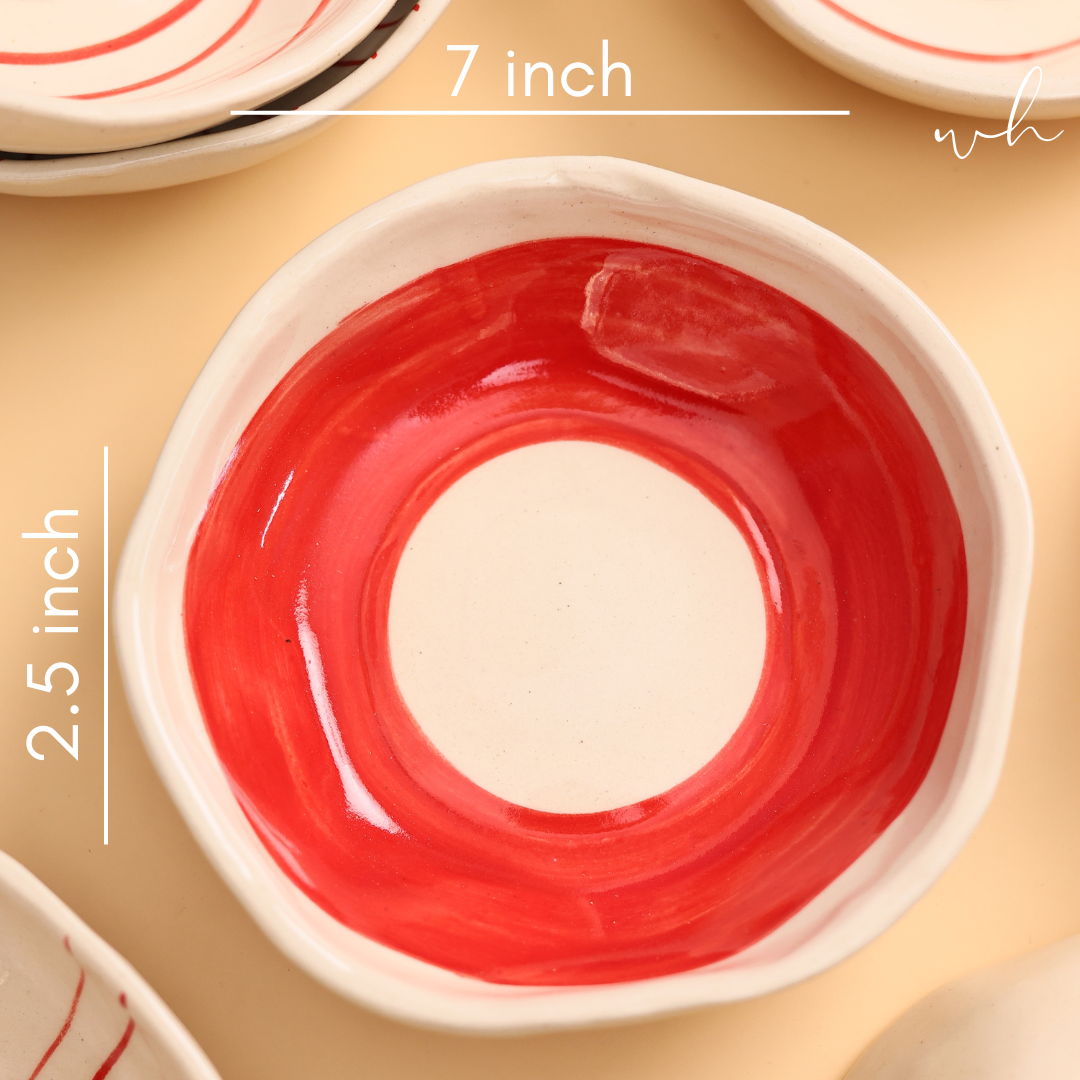 red and white handcrafted bowl