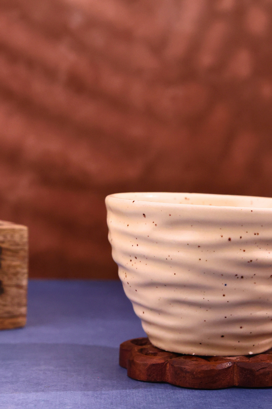 Closeup of white twirl mug