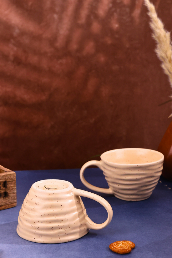Two decent white twirl coffee mugs 
