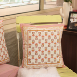 Cotton block printed cushion cover on chair