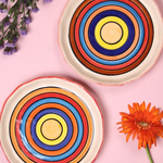 Rainbow swirl plates with flowers