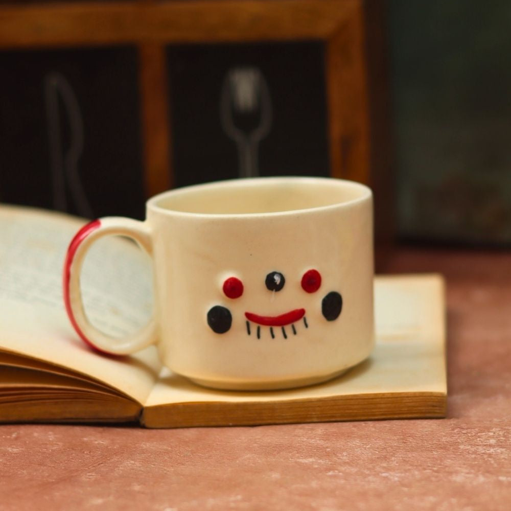 Quirky face mug made by ceramic