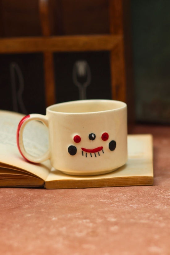 Quirky face mug made by ceramic