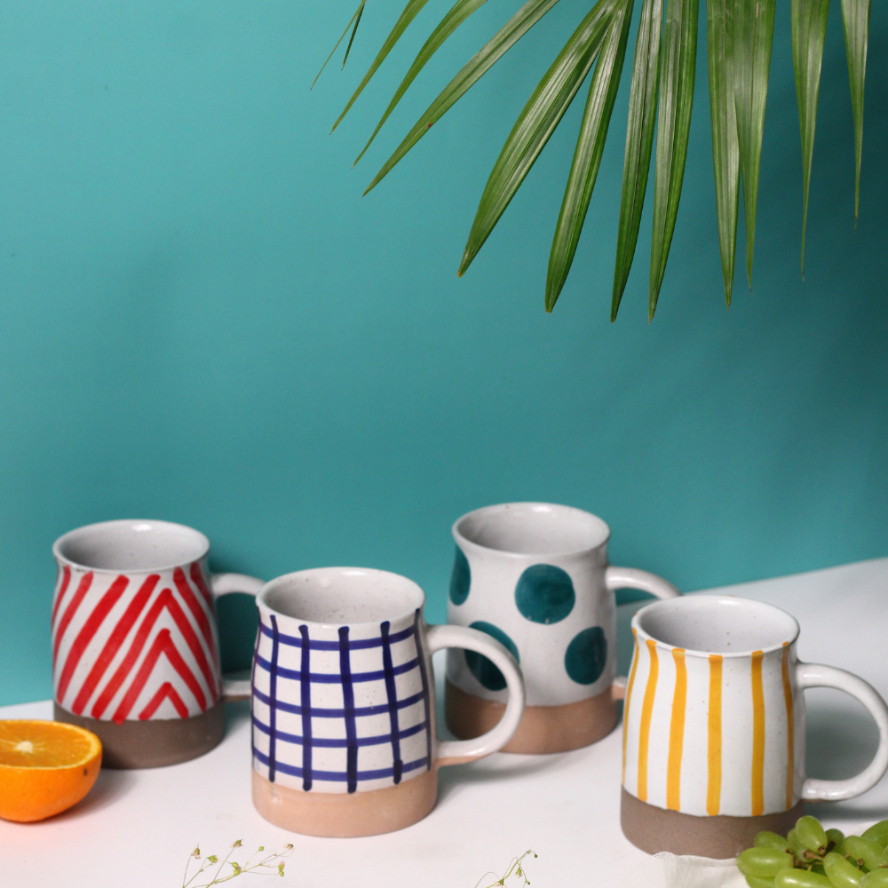 handmade coffee mugs with different patterns 