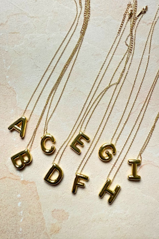 Initial Necklaces with golden color