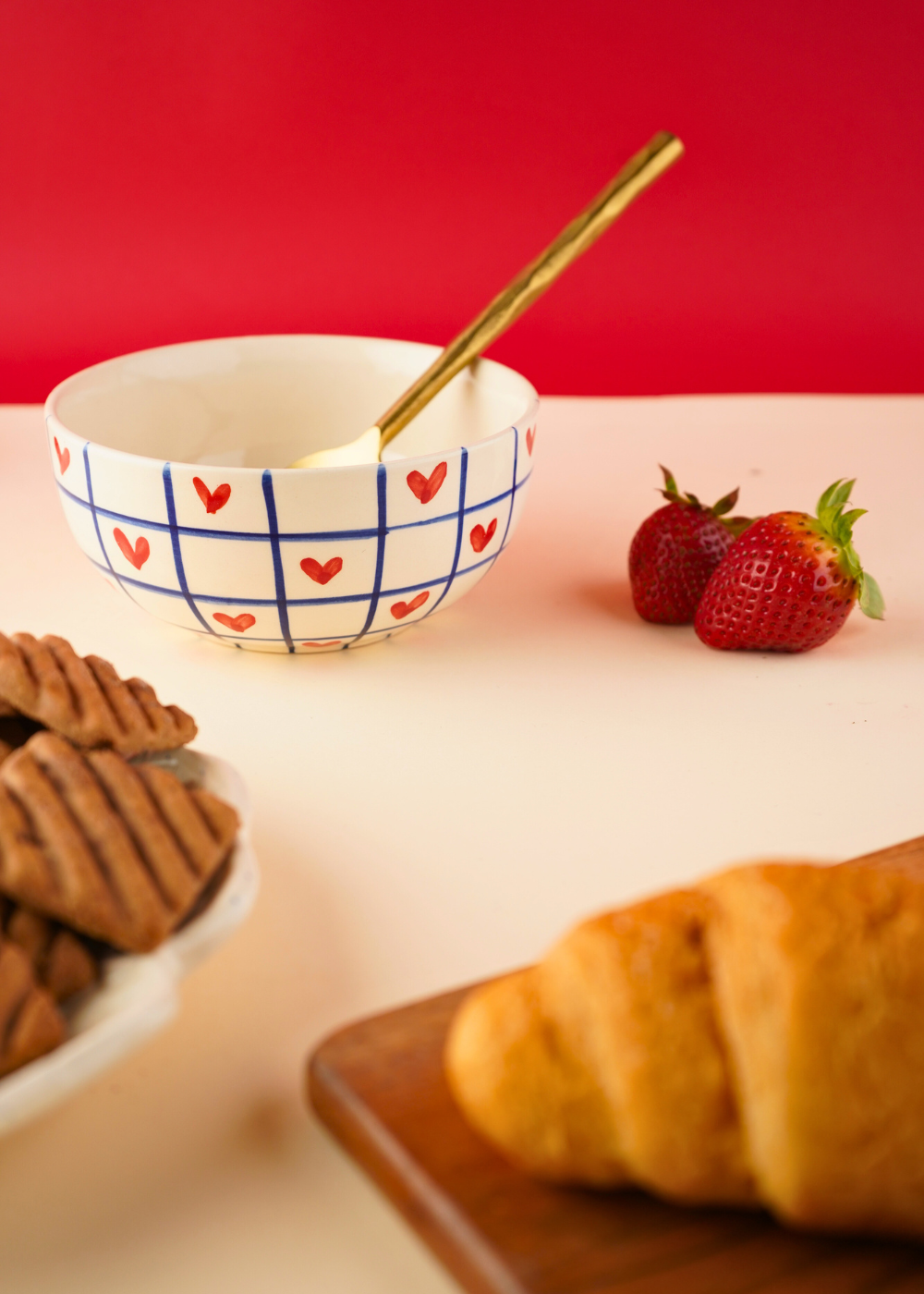 handmade blue chequered heart bowl with blue chequered lines & red Heart design