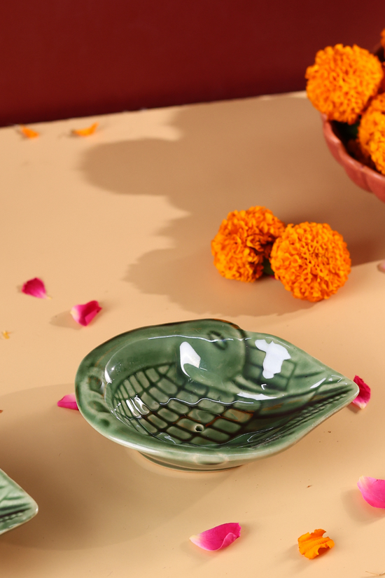 Duck designed green agarbati stand 