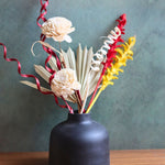 black round vase with assorted bunch combo made by handcrafted