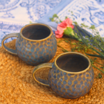 Two ceramic honeycomb mugs 