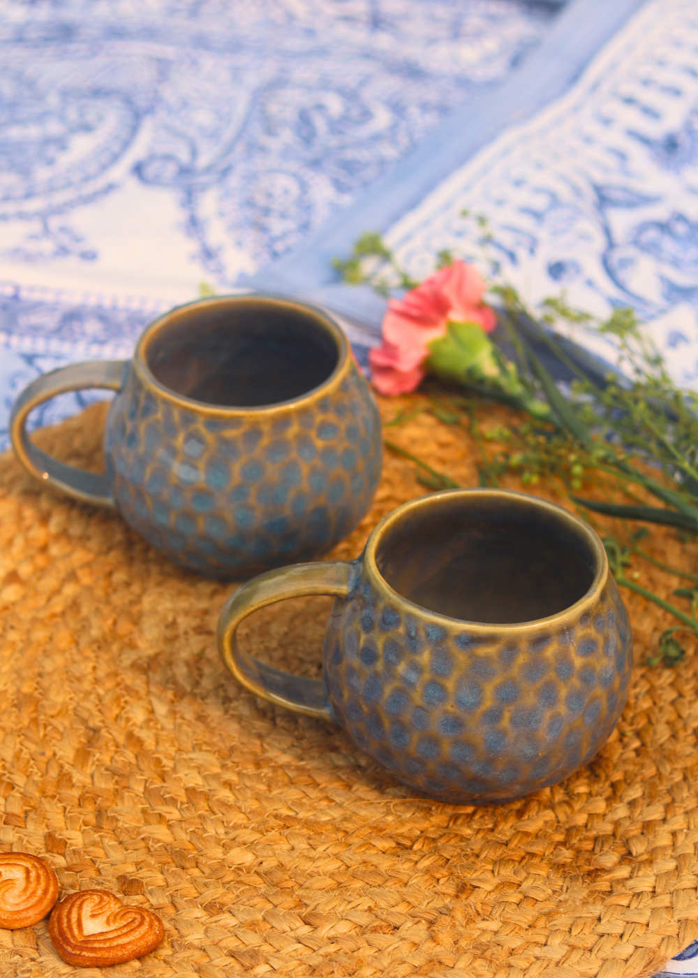 Two ceramic honeycomb mugs 