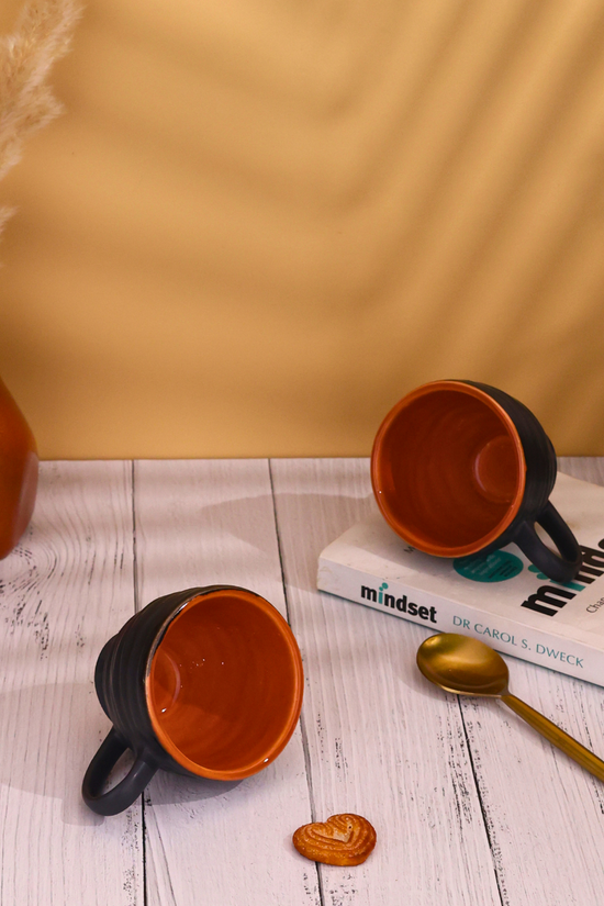 Ceramic cup with rust color in it