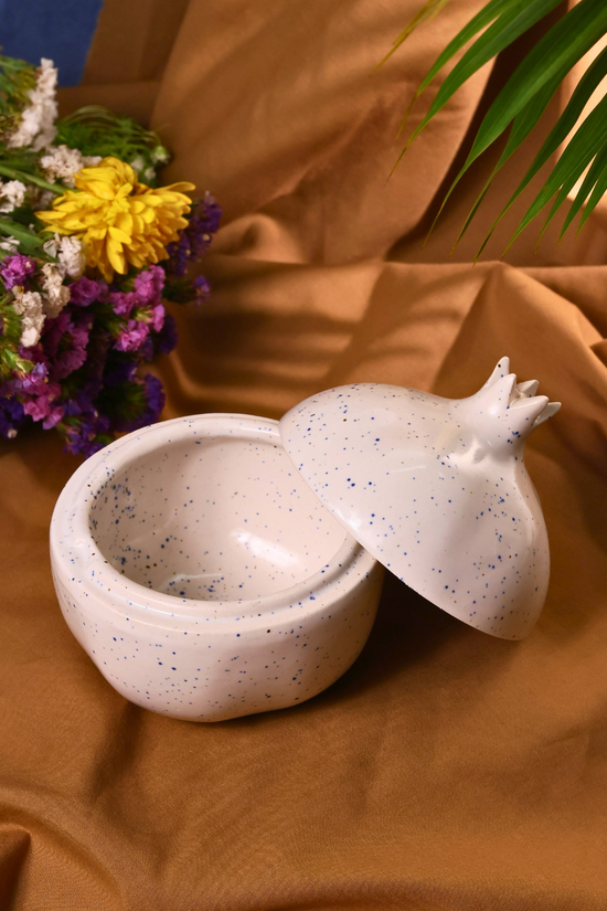 Anar shaped white speckled jar
