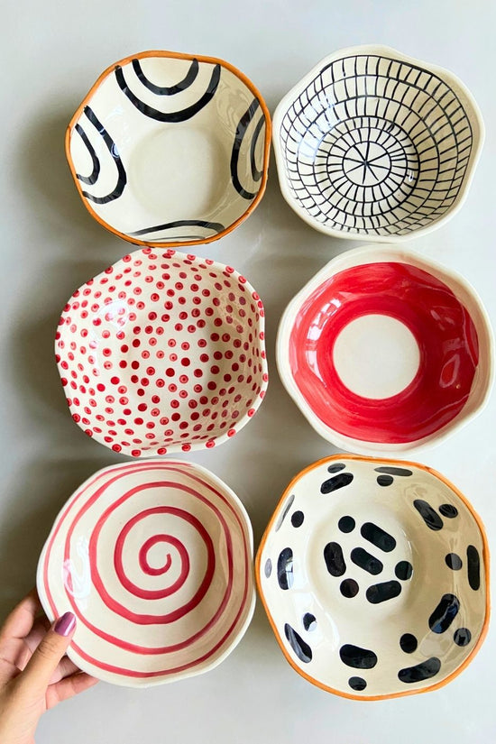 Red & black Bowls made by ceramic 