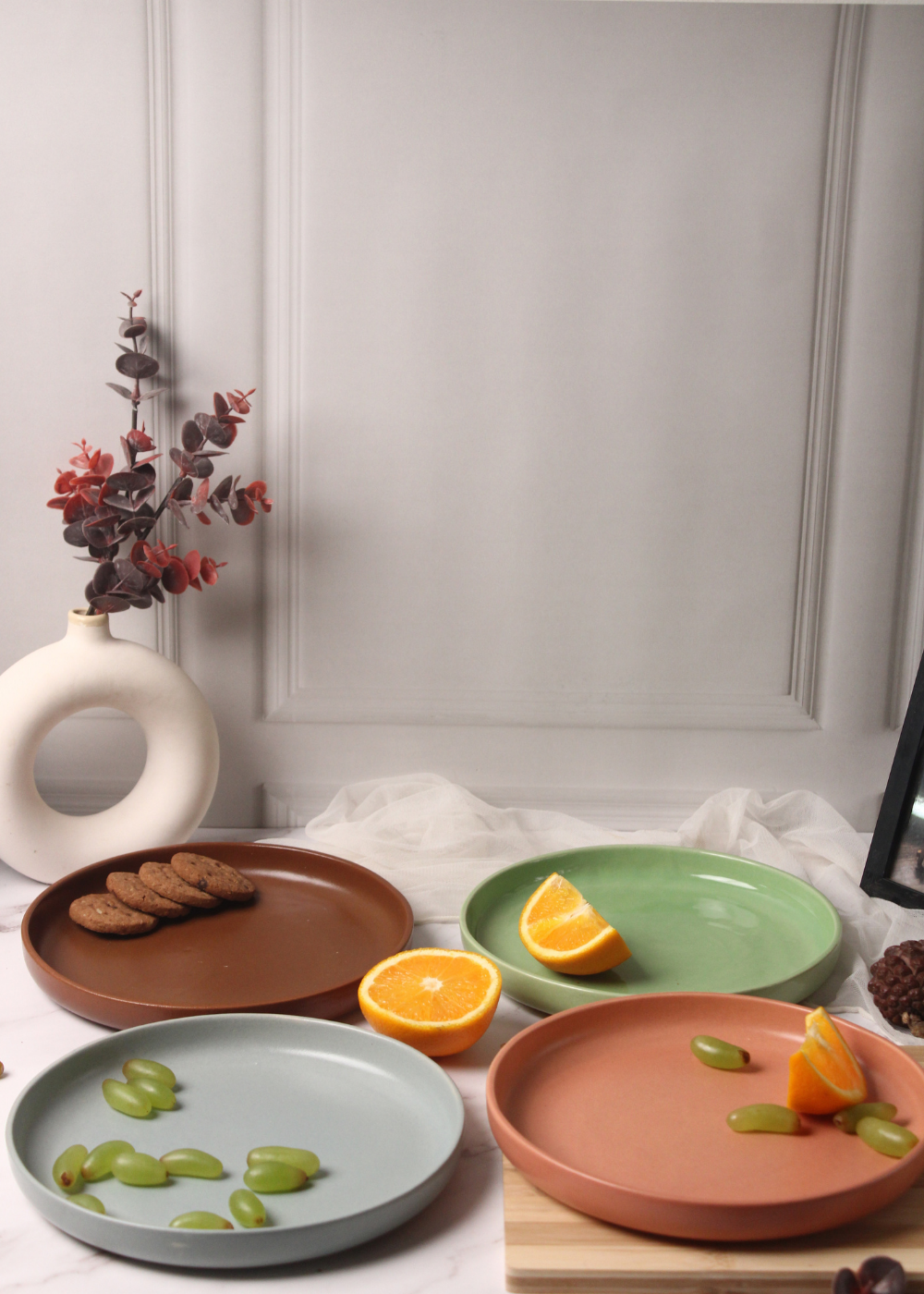 handmade mimimal platter set of four platters with different colors grey, green, pink & brown
