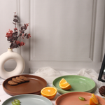 handmade mimimal platter set of four platters with different colors grey, green, pink & brown