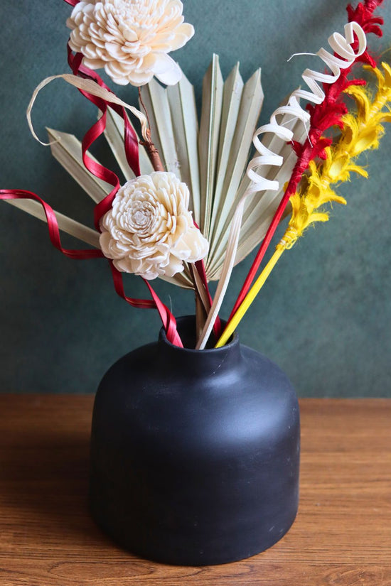black round vase with assorted bunch combo for your home decor