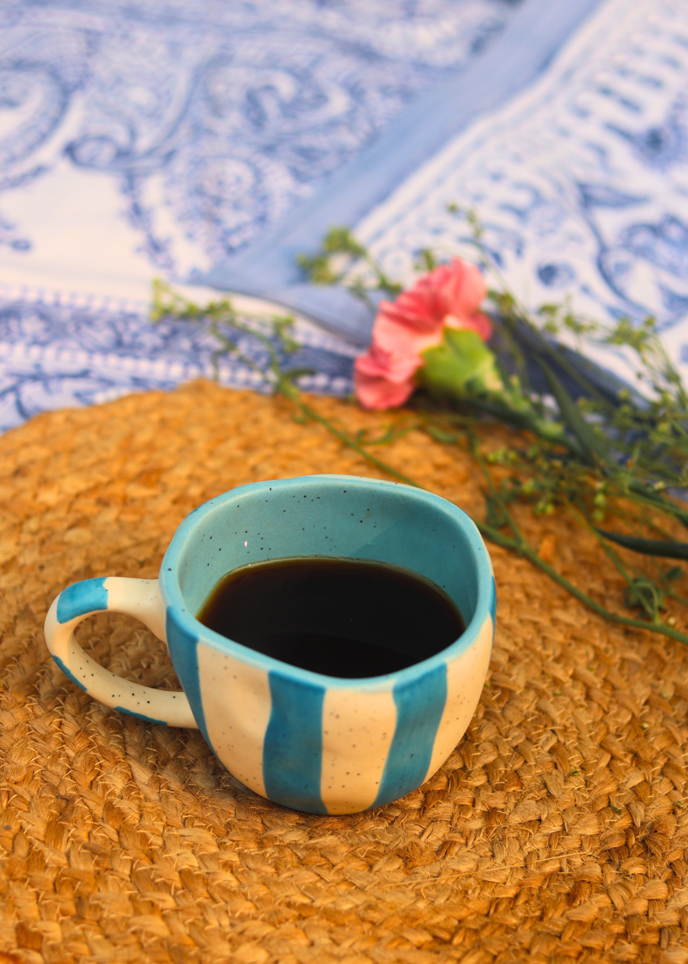 Handmade ceramic mug with tea 