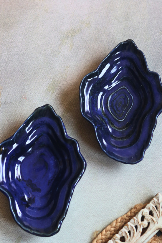 Two handmade ceramic wavy bowls 